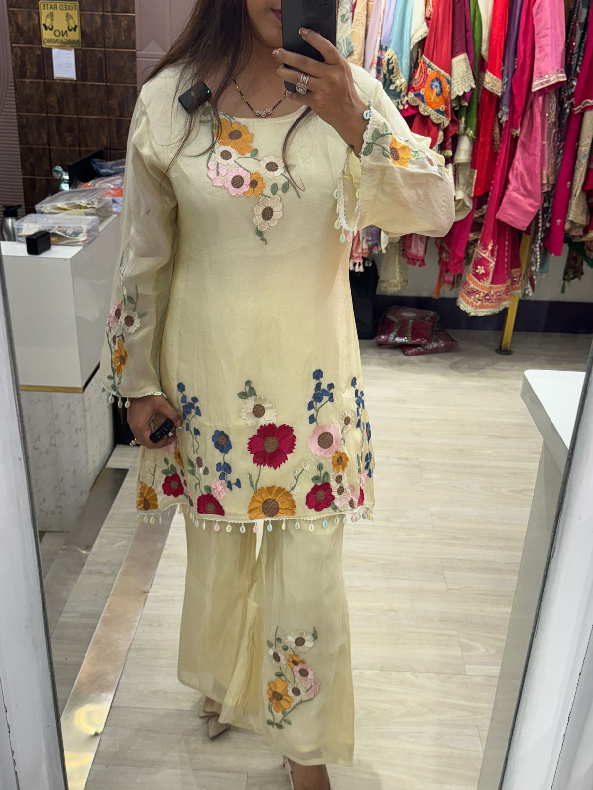 Pastel Yellow Kurta & Pants with Intricate Floral Work & Tassel Detailing