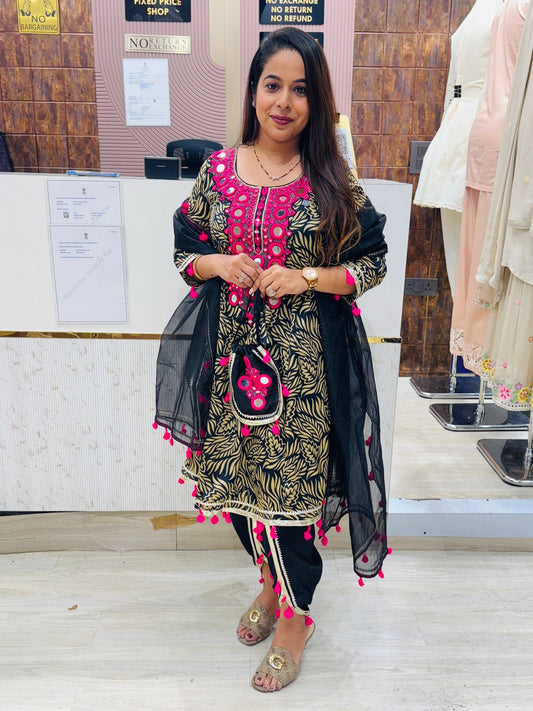 Black & Gold Printed Stitched Suit Set with Mirror Work and Pom-Pom Dupatta – Includes Matching Potli Bag