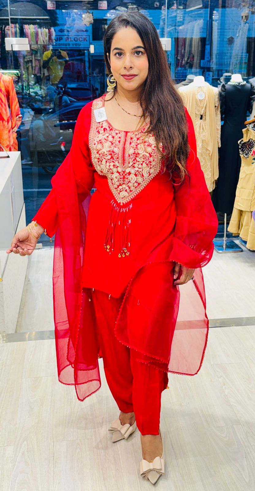 Red Stitched Suit with Heavy Embroidered Neckline & Tassel Detailing