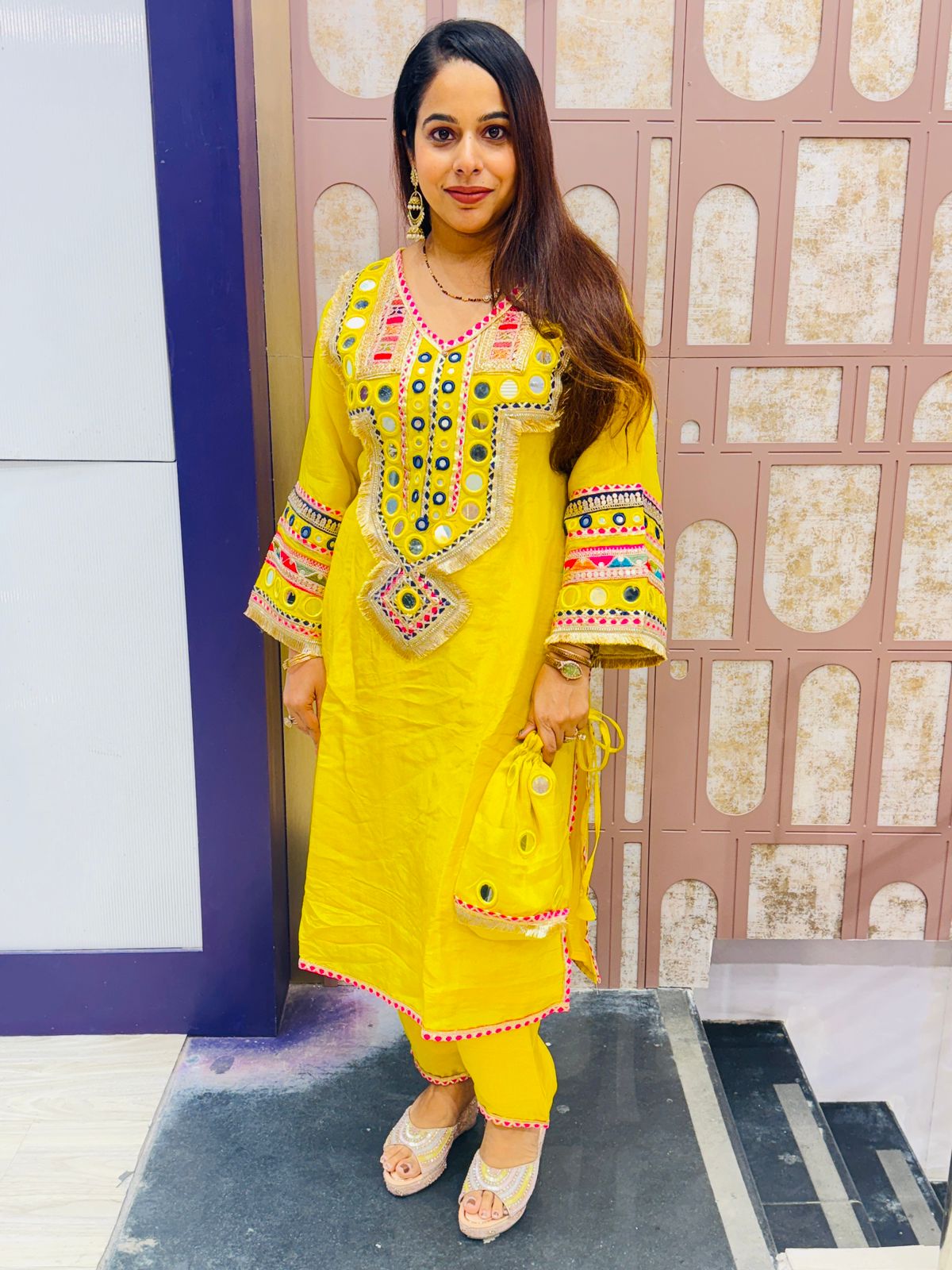 Mustard Yellow Mirror Work Suit with Matching Potli Bag