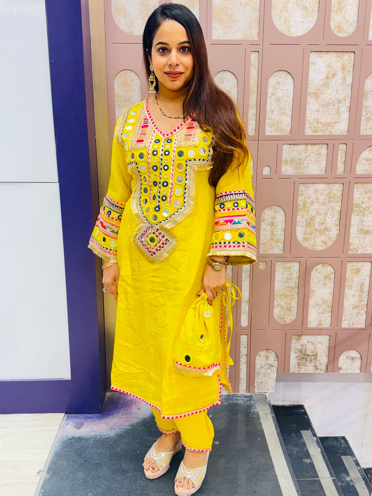 Mustard Yellow Mirror Work Suit with Matching Potli Bag