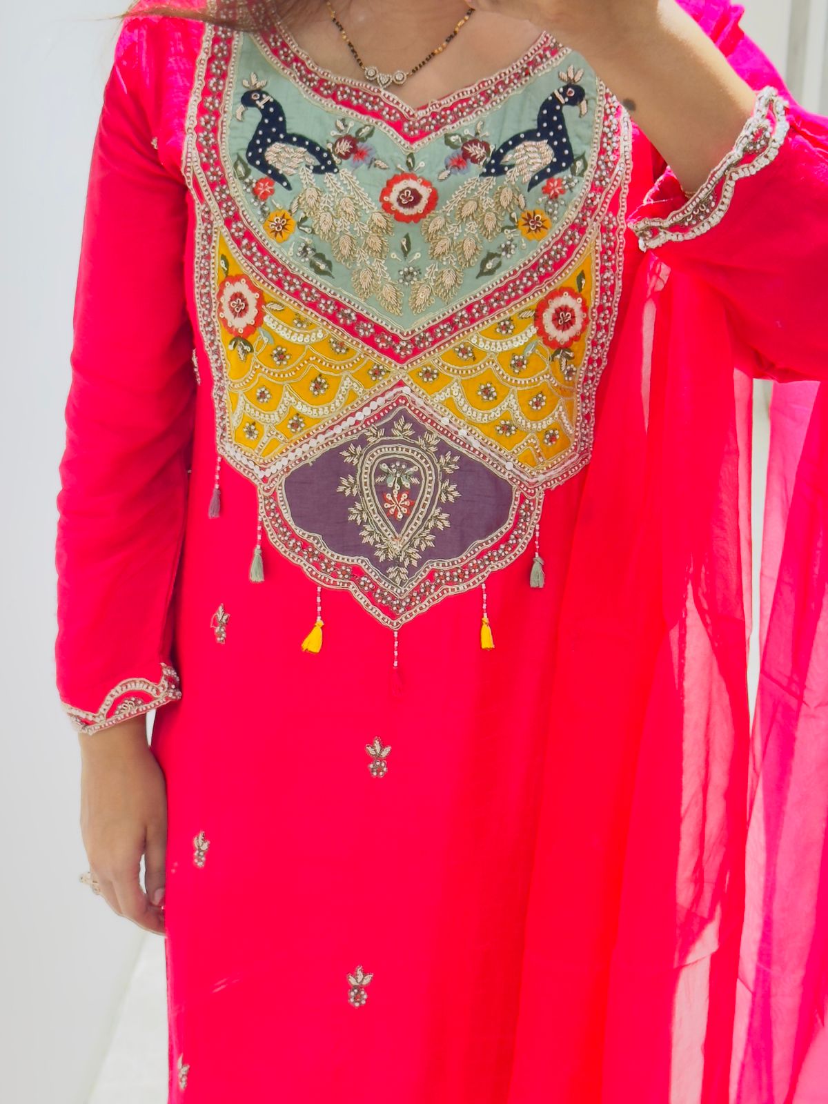 Hot Pink Stitched Suit with Multicolour Embroidery on Neckline