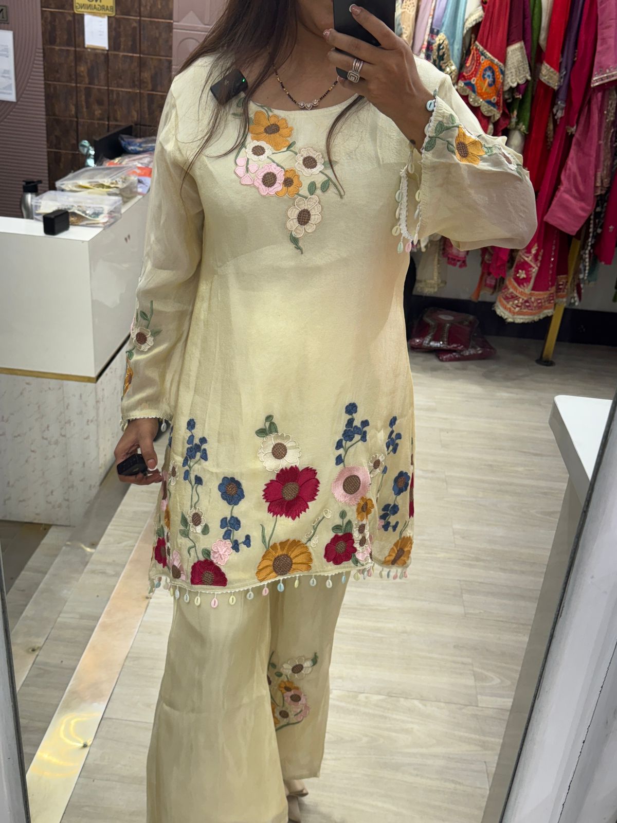 Pastel Yellow Kurta & Pants with Intricate Floral Work & Tassel Detailing