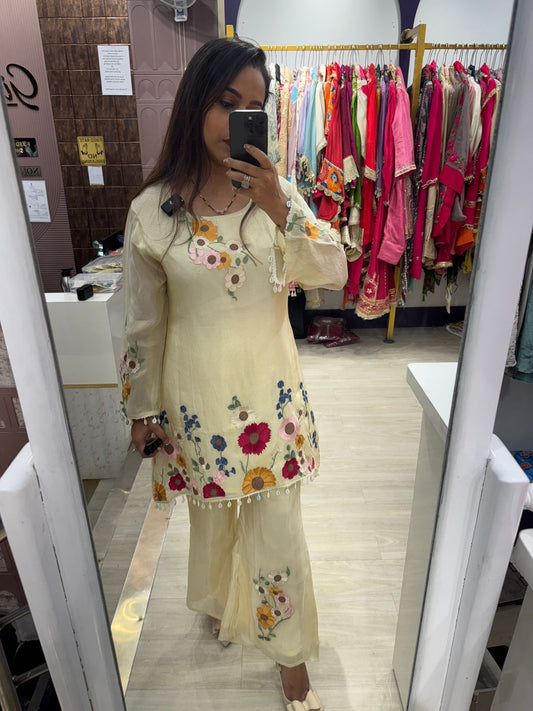 Pastel Yellow Kurta & Pants with Intricate Floral Work & Tassel Detailing